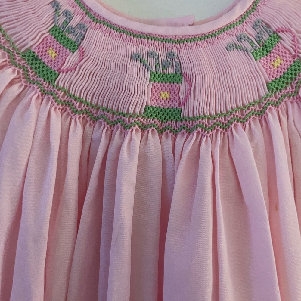 Smocked pink golf dress